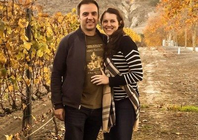happy couple in winery
